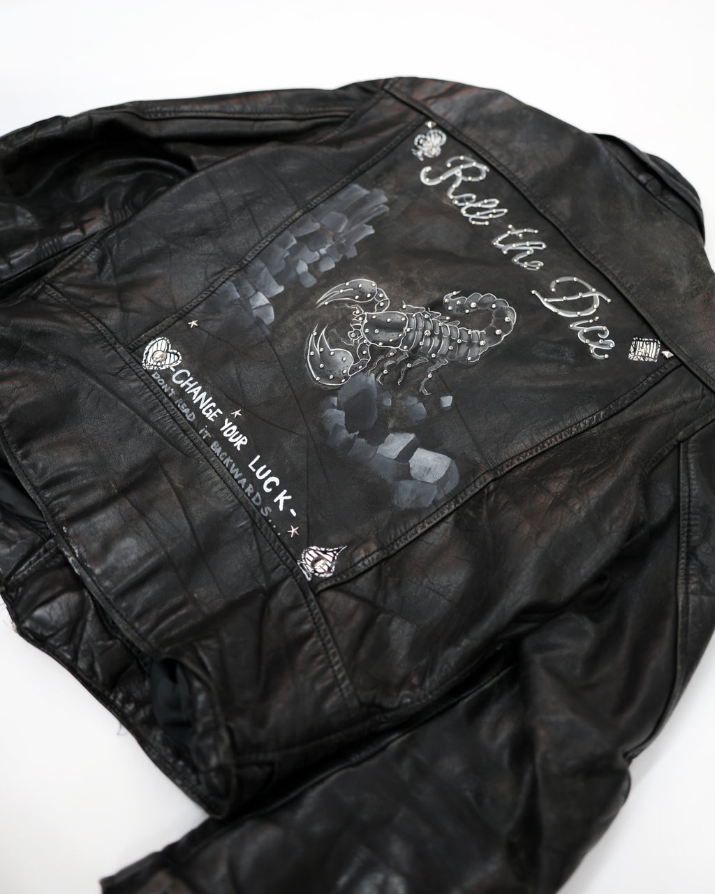 STUDDED & PAINTED LEATHER JACKET
